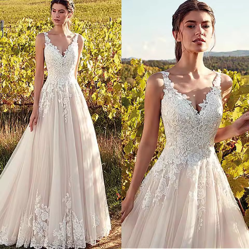 Lace & tulle vintage style wedding dress with lace up back.
